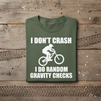 Load image into Gallery viewer, 😂 I Don’t Crash, I Do Random Gravity Checks – Mountain Biking Tee 🚵‍♂️